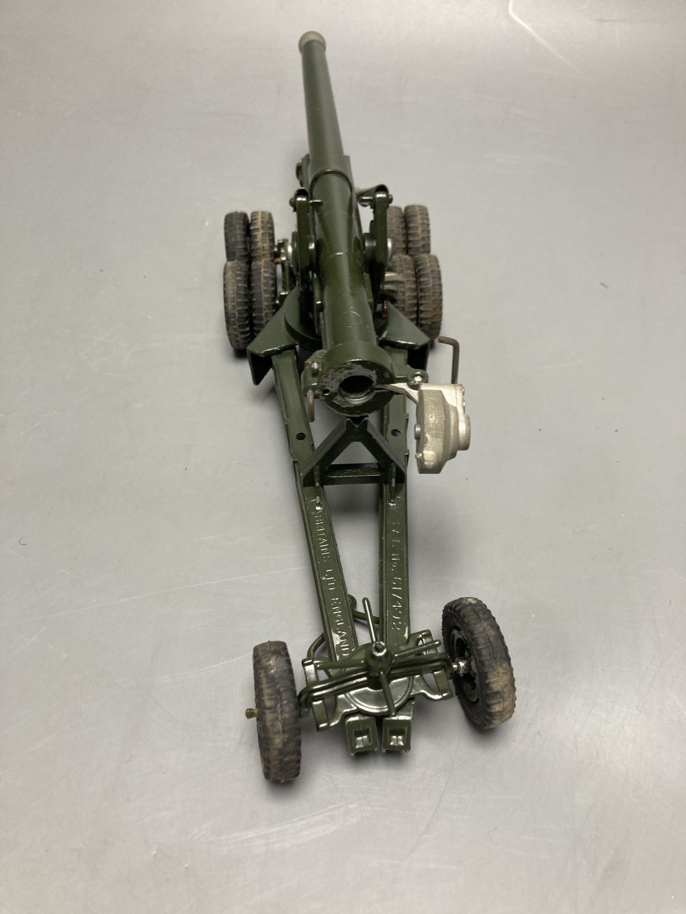 A Britains 155mm gun, with shell case, loader and six shells supplied, boxed, 30cm long